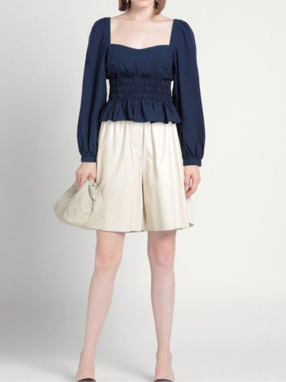 Ciao Luci Navy Smocked Peplum Top